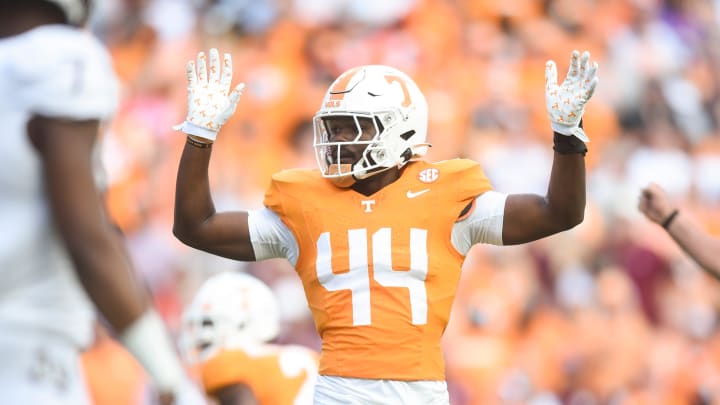 Tennessee linebacker Elijah Herring (44) raises his hands on the field during a football game Tennessee linebacker Elijah Herring (44) raises his hands on the field during a football game