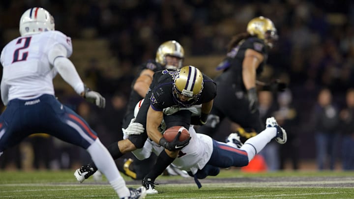 Oct 29, 2011; Seattle, WA, USA; Washington Huskies wide receiver Jermaine Kearse (15) dives forward to gain extra yards during the 2nd half against the Arizona Wildcats at Husky Stadium. Washington defeated Arizona 42-31. Mandatory Credit: Steven Bisig-Imagn Images