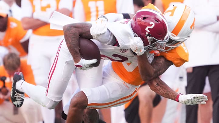 Tennessee defensive back Jalen McMurray (6) pulls down Alabama wide receiver Ryan Williams (2) during their game at Neyland Stadium on Saturday, Oct. 19, 2024, in Knoxville. Tenn.