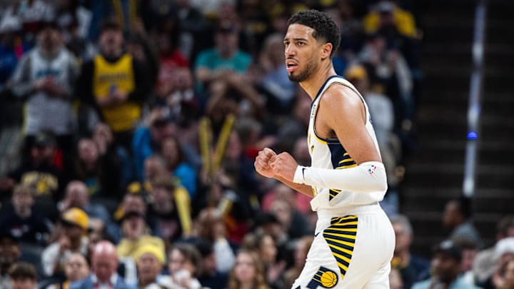 Mar 4, 2025; Indianapolis, Indiana, USA; Indiana Pacers guard Tyrese Haliburton (0) celebrates a made basket in the second half against the Houston Rockets at Gainbridge Fieldhouse. Mandatory Credit: Trevor Ruszkowski-Imagn Images