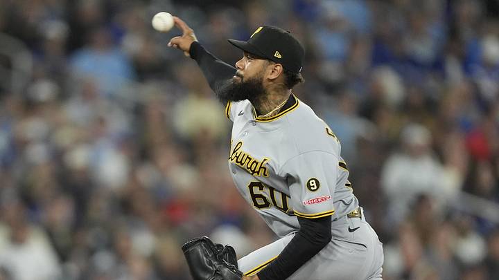 May 22, 2026; Toronto, Ontario, CAN; Pittsburgh Pirates pitcher Dennis Santana (60) pitches to the Toronto Blue Jays during the eighth inning at Rogers Centre. Mandatory Credit: John E. Sokolowski-Imagn Images