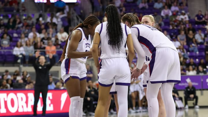 TCU players gather in a huddle versus Texas Tech. TCU players gather in a huddle versus Texas Tech.