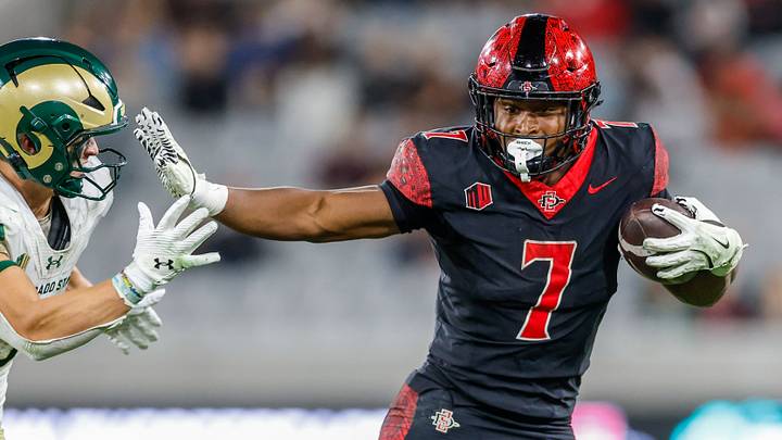 Oct 3, 2025; San Diego, California, USA; San Diego State Aztecs running back Lucky Sutton (7). Oct 3, 2025; San Diego, California, USA; San Diego State Aztecs running back Lucky Sutton (7).