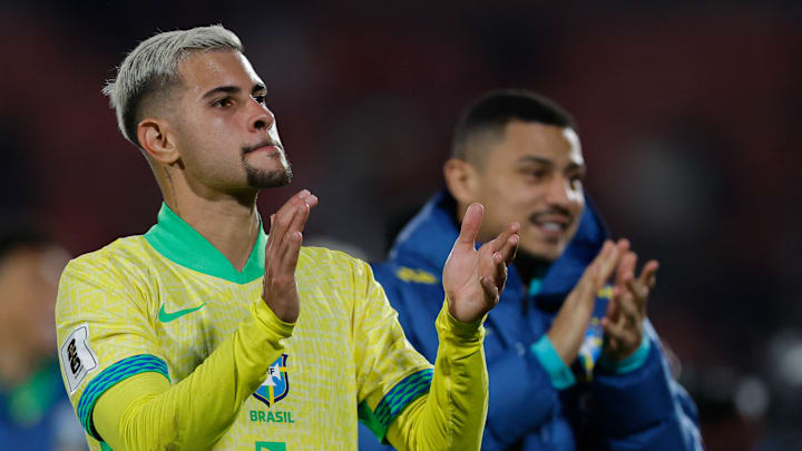 Bruno and Andre acknowledge the Brazil fans after the game 
