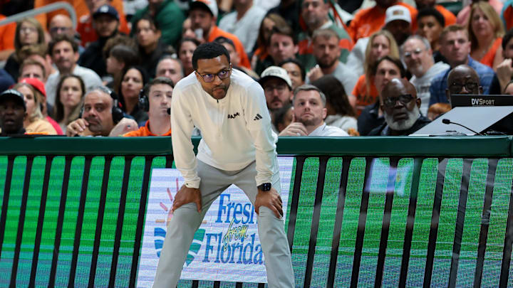 Feb 10, 2026; Coral Gables, Florida, USA; Miami Hurricanes head coach Jai Lucas looks on from sideline against the North Carolina Tar Heels during the second half at Watsco Center. Mandatory Credit: Sam Navarro-Imagn Images