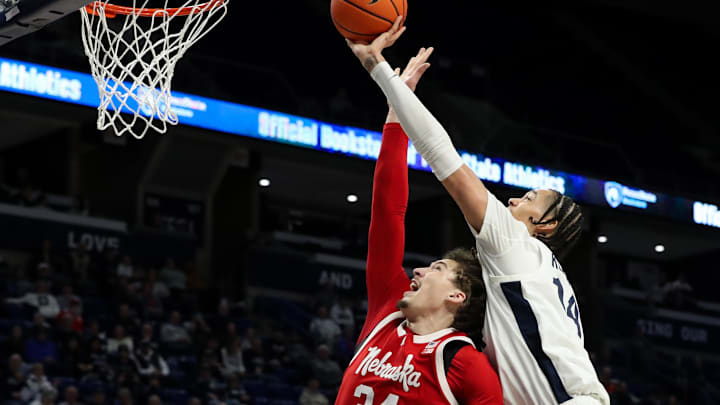 Penn State Nittany Lions forward Yanic Konan Niederhauser (14) attempts to tip the ball into the basket during the first half against the Nebraska Cornhuskers at Bryce Jordan Center.