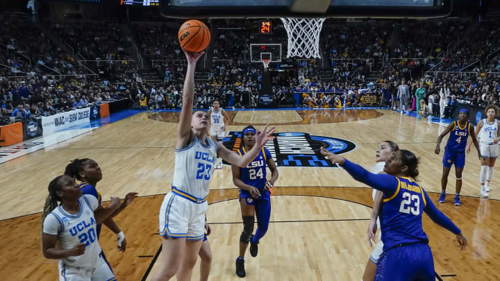 Mar 30, 2024; Albany, NY, USA; UCLA Bruins forward Gabriela Jaquez (23) shoots a layup against LSU.