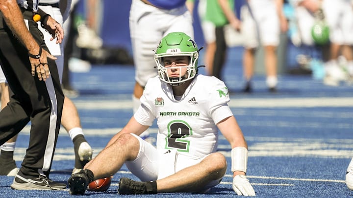 Sep 16, 2023; Boise, Idaho, USA; North Dakota Fighting Hawks quarterback Tommy Schuster (2) reacts to being sacked during second half action against the Boise State Broncos  at Albertsons Stadium. Mandatory Credit: Brian Losness-USA TODAY Sports
