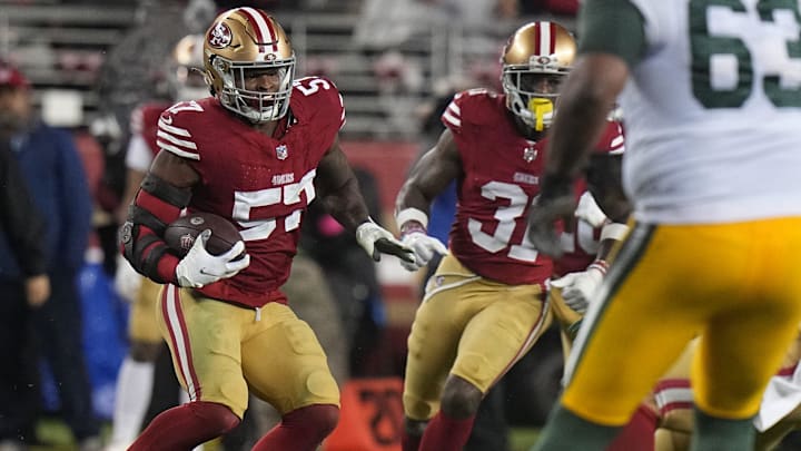San Francisco 49ers linebacker Dre Greenlaw (57) intercepts a pass during the third quarter of their NFC divisional playoff game Saturday, January 20, 2024 at Levi    Stadium in Santa Clara, California. The San Francisco 49ers beat the Green Bay Packers 24-21.