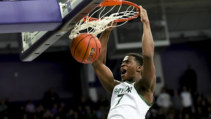 Mar 4, 2025; Fort Worth, Texas, USA; Baylor Bears guard VJ Edgecombe (7) dunks during the second half against the TCU Horned Frogs at Ed and Rae Schollmaier Arena. Mandatory Credit: Kevin Jairaj-Imagn Images