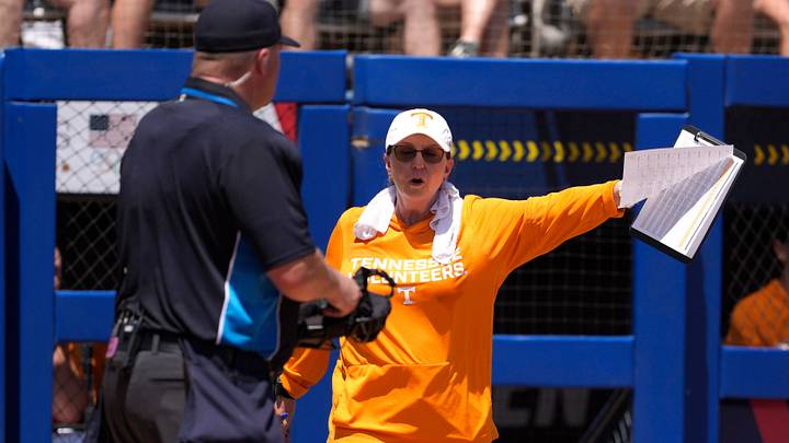 Tennessee Lady Volunteers head coach Karen Weekly talks with an official during a Women's College World Series softball game between the University of Texas Longhorns and the Tennessee Lady Volunteers at Devon Park in Oklahoma City, Monday, June 1, 2026. Tennessee Lady Volunteers head coach Karen Weekly talks with an official during a Women's College World Series softball game between the University of Texas Longhorns and the Tennessee Lady Volunteers at Devon Park in Oklahoma City, Monday, June 1, 2026.