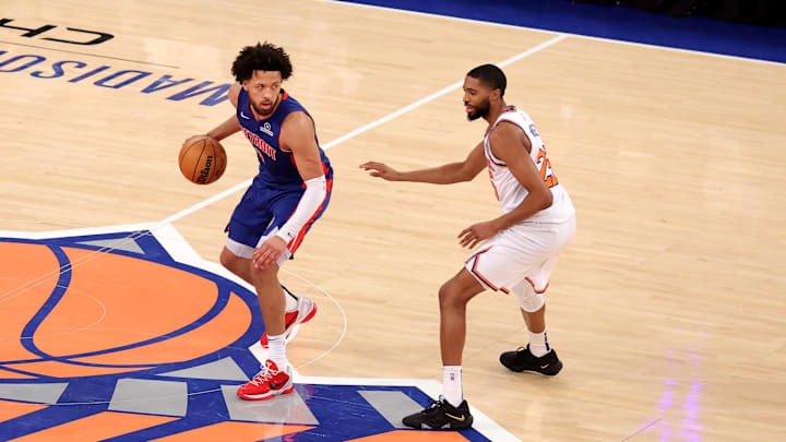 Jan 13, 2025; New York, New York, USA; Detroit Pistons guard Cade Cunningham (2) controls the ball against New York Knicks forward Mikal Bridges (25) during the fourth quarter at Madison Square Garden. Mandatory Credit: Brad Penner-Imagn Images