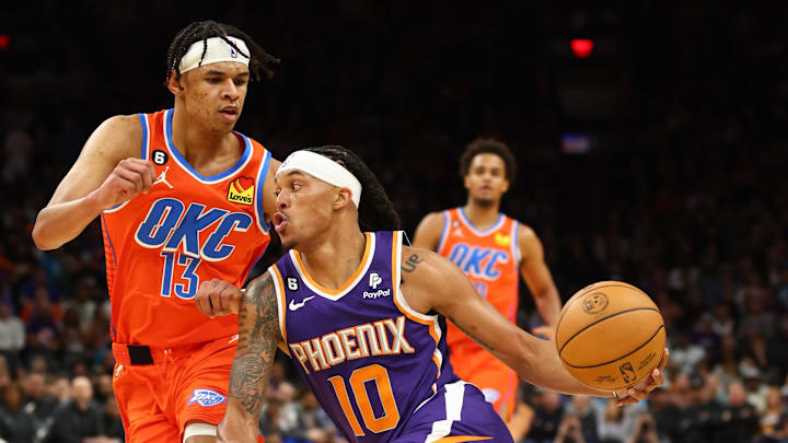 Phoenix Suns guard Damion Lee drives to the basket against Oklahoma City Thunder forward Ousmane Dieng