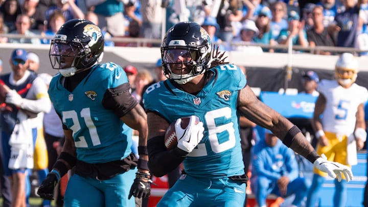 Jacksonville Jaguars safety Antonio Johnson (26) runs back an interception during the fourth quarter in an NFL football game at EverBank Stadium, Sunday, November 16, 2025, in Jacksonville, Fla. [Doug Engle/Florida Times-Union]