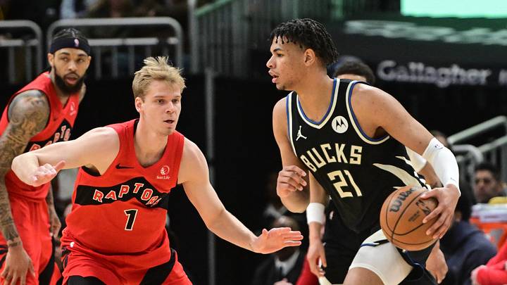 Feb 22, 2026; Milwaukee, Wisconsin, USA; Milwaukee Bucks forward Ousmane Dieng (21) looks for a shot against Toronto Raptors guard Gradey Dick (1) in the first quarter at Fiserv Forum. Mandatory Credit: Benny Sieu-Imagn Images Feb 22, 2026; Milwaukee, Wisconsin, USA; Milwaukee Bucks forward Ousmane Dieng (21) looks for a shot against Toronto Raptors guard Gradey Dick (1) in the first quarter at Fiserv Forum. Mandatory Credit: Benny Sieu-Imagn Images