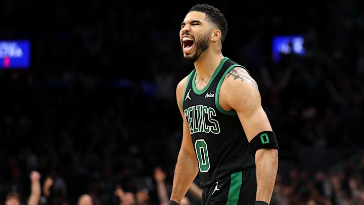 Jayson Tatum celebrates as the Boston Celtics defeat the Orlando Magic in Game 5 of their first-round series.