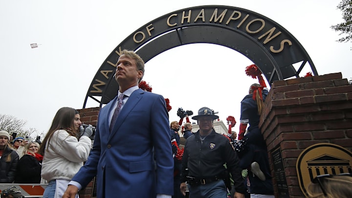 Nov 12, 2022; Oxford, Mississippi, USA; Mississippi Rebels head coach Lane Kiffin walks through the Walk of Champions in the Grove at the University of Mississippi before the game between the Alabama Crimson Tide and the Mississippi Rebels. Mandatory Credit: Petre Thomas-USA TODAY Sports