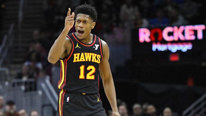 Nov 27, 2024; Cleveland, Ohio, USA; Atlanta Hawks guard Kobe Bufkin (4) celebrates his three-point basket in the first quarter against the Cleveland Cavaliers at Rocket Mortgage FieldHouse. Mandatory Credit: David Richard-Imagn Images