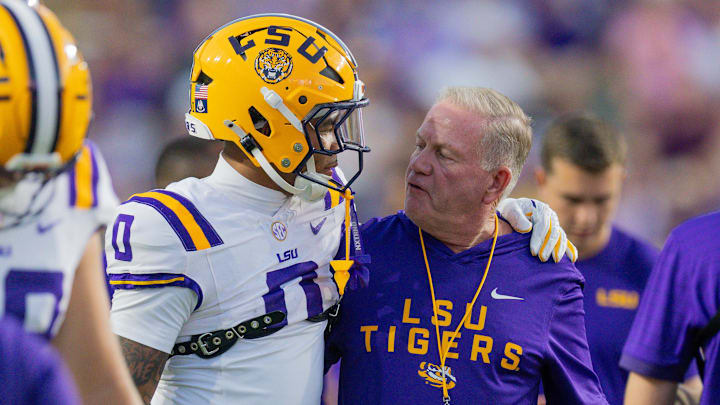 LSU Tigers head coach Brian Kelly talks to wide receiver Zavion Thomas (0) against the South Carolina Gamecocks during the first half at Tiger Stadium. Credit: Stephen Lew-Imagn Images