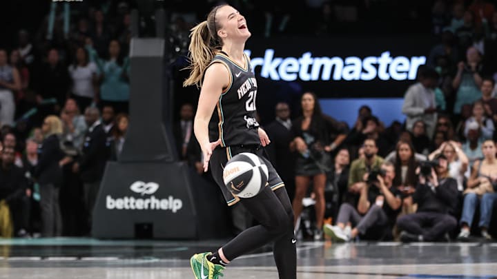Jun 17, 2025; Brooklyn, New York, USA;  New York Liberty guard Sabrina Ionescu (20) celebrates in the final seconds of the fourth quarter against the Atlanta Dream at Barclays Center. Mandatory Credit: Wendell Cruz-Imagn Images