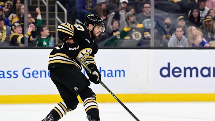 Sep 24, 2023; Boston, Massachusetts, USA; Boston Bruins defenseman Jakub Zboril (67) passes the puck during the second period against the New York Rangers at TD Garden. Mandatory Credit: Eric Canha-Imagn Images