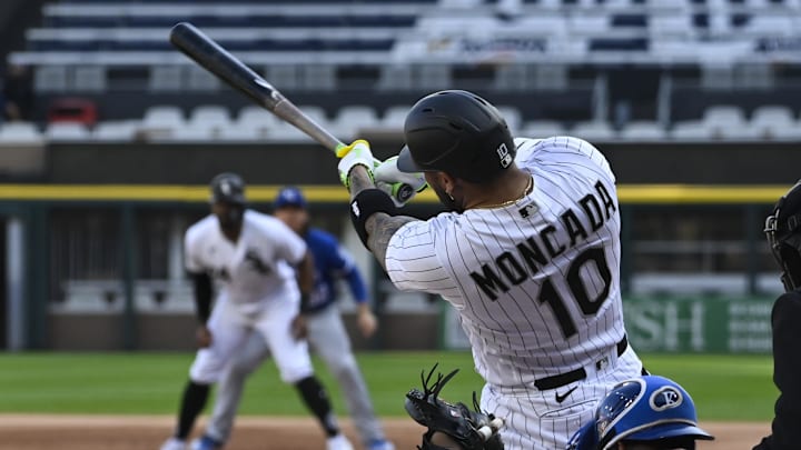 Sep 12, 2023; Chicago, Illinois, USA;  Chicago White Sox third baseman Yoan Moncada (10) hits an RBI single against the Kansas City Royals during the first inning at Guaranteed Rate Field.