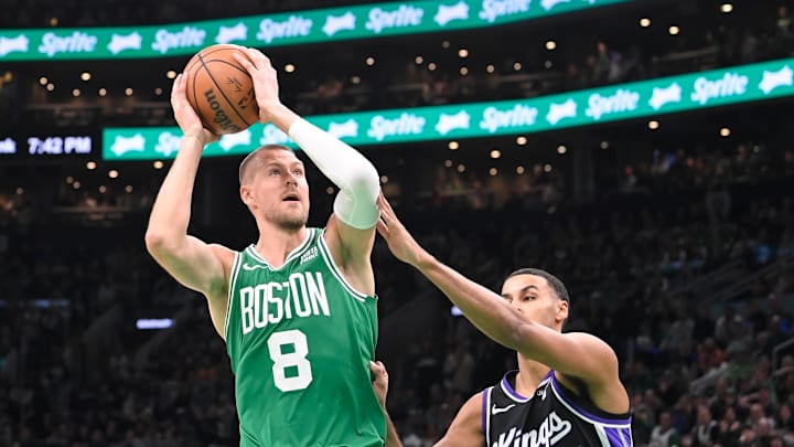 Apr 5, 2024; Boston, Massachusetts, USA; Boston Celtics center Kristaps Porzingis (8) shoots the ball against the Sacramento Kings - Eric Canha/USA TODAY Sports Apr 5, 2024; Boston, Massachusetts, USA; Boston Celtics center Kristaps Porzingis (8) shoots the ball against the Sacramento Kings - Eric Canha/USA TODAY Sports