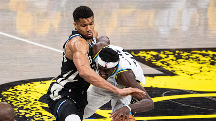 Apr 29, 2025; Indianapolis, Indiana, USA; Milwaukee Bucks forward Giannis Antetokounmpo (34) and Indiana Pacers forward Pascal Siakam (43) fight for the ball during game five of the first round for the 2024 NBA Playoffs at Gainbridge Fieldhouse. Mandatory Credit: Trevor Ruszkowski-Imagn Images Apr 29, 2025; Indianapolis, Indiana, USA; Milwaukee Bucks forward Giannis Antetokounmpo (34) and Indiana Pacers forward Pascal Siakam (43) fight for the ball during game five of the first round for the 2024 NBA Playoffs at Gainbridge Fieldhouse. Mandatory Credit: Trevor Ruszkowski-Imagn Images