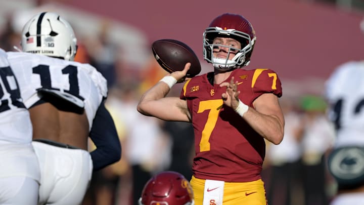 Oct 12, 2024; Los Angeles, California, USA; USC Trojans quarterback Miller Moss (7) throws a pass against the Penn State Nittany Lions at United Airlines Field at Los Angeles Memorial Coliseum. Mandatory Credit: Jayne Kamin-Oncea-Imagn Images Oct 12, 2024; Los Angeles, California, USA; USC Trojans quarterback Miller Moss (7) throws a pass against the Penn State Nittany Lions at United Airlines Field at Los Angeles Memorial Coliseum. Mandatory Credit: Jayne Kamin-Oncea-Imagn Images