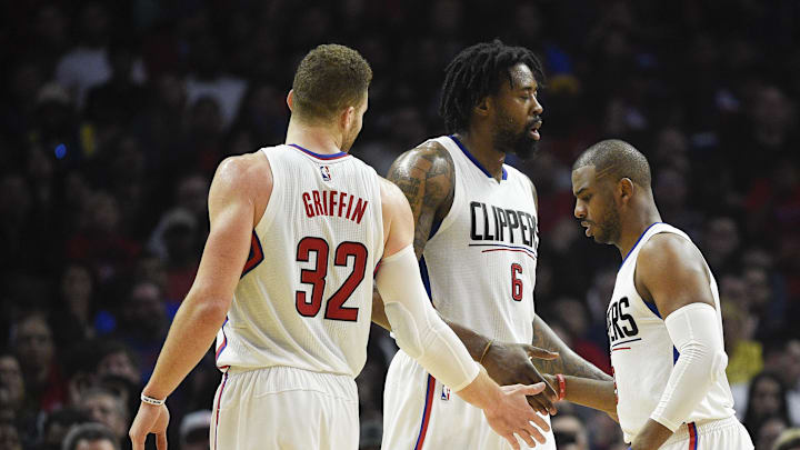 LA Clippers guard Chris Paul, center DeAndre Jordan (6) and forward Blake Griffin (32) against the Washington Wizards at Staples Center.