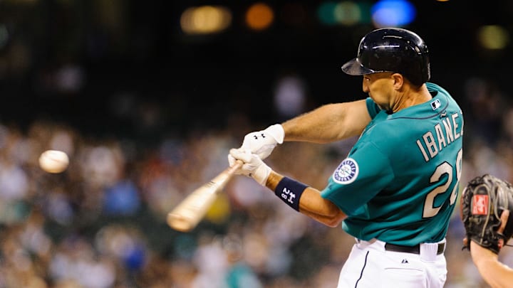 Seattle Mariners left fielder Raul Ibanez (28) hits the ball against the Los Angeles Angels during the game at Safeco Field. Los Angeles defeated Seattle 2-0 in 2013. Seattle Mariners left fielder Raul Ibanez (28) hits the ball against the Los Angeles Angels during the game at Safeco Field. Los Angeles defeated Seattle 2-0 in 2013.