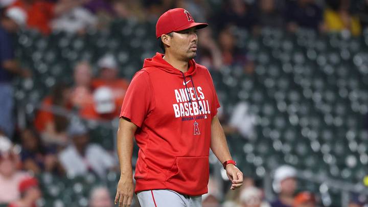 Aug 19, 2026; Houston, Texas, USA; Los Angeles Angels manager Kurt Suzuki (8) walks to the mound for a pitching change during the eighth inning against the Houston Astros at Daikin Park. Mandatory Credit: Troy Taormina-Imagn Images
