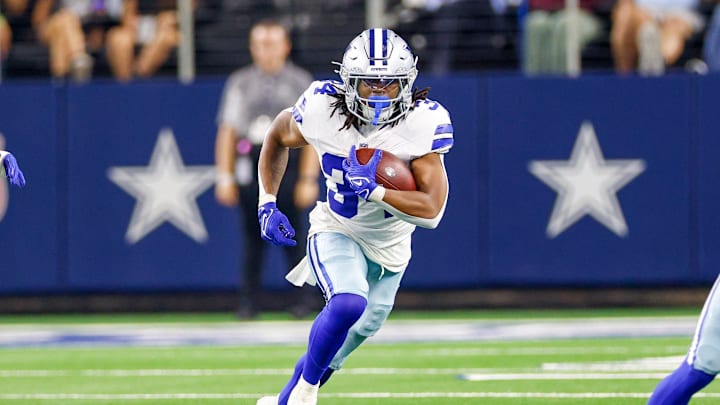 Aug 22, 2025; Arlington, Texas, USA; Dallas Cowboys running back Jaydon Blue (34) carries the ball during the fourth quarter against the Atlanta Falcons at AT&T Stadium. Mandatory Credit: Andrew Dieb-Imagn Images
