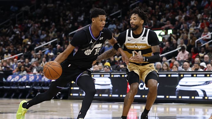 Mar 5, 2026; Washington, District of Columbia, USA; Utah Jazz guard Ace Bailey (19) drives to the basket as Washington Wizards forward Leaky Black (14) defends in the second half at Capital One Arena. Mandatory Credit: Geoff Burke-Imagn Images