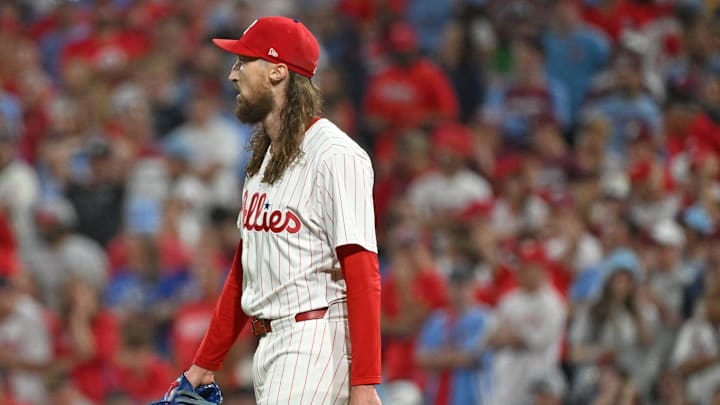 Oct 4, 2025; Philadelphia, Pennsylvania, USA; Philadelphia Phillies pitcher Matt Strahm (25) reacts after allowing a home run during the seventh inning against the Los Angeles Dodgers during game one of the NLDS round for the 2025 MLB playoffs at Citizens Bank Park. Mandatory Credit: Eric Hartline-Imagn Images