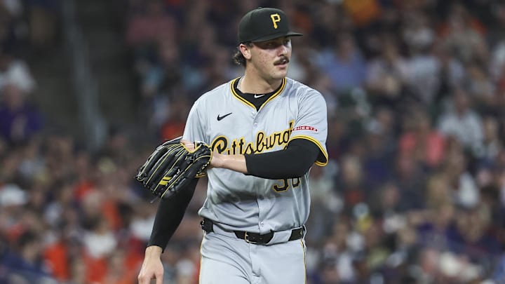Jul 29, 2024; Houston, Texas, USA; Pittsburgh Pirates starting pitcher Paul Skenes (30) reacts after a play during the third inning against the Houston Astros at Minute Maid Park. Mandatory Credit: Troy Taormina-Imagn Images