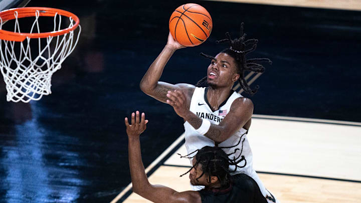 Vanderbilt Commodores guard Jason Edwards (1) is fouled by Maryland-Eastern Shore Hawks guard Ralph Martino Jr. (1) on the shot during their game at Memorial Gym in Nashville, Tenn., Monday, Nov. 4, 2024.