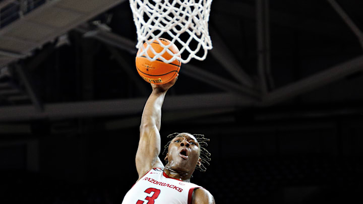 Arkansas junior transfer forward Adou Thiero goes up for a dunk in Wednesday game against Ole Miss at Bud Walton Arena