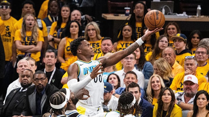 Apr 29, 2025; Indianapolis, Indiana, USA; Indiana Pacers guard Bennedict Mathurin (00) shoots the ball while Milwaukee Bucks forward Bobby Portis (9) defends during game five of the first round for the 2024 NBA Playoffs at Gainbridge Fieldhouse. Mandatory Credit: Trevor Ruszkowski-Imagn Images
