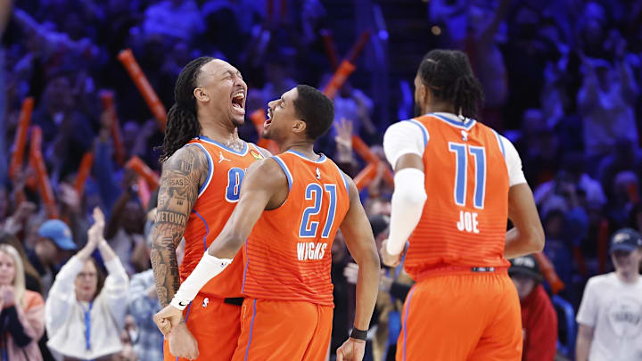 Jan 3, 2025; Oklahoma City, Oklahoma, USA; Oklahoma City Thunder forward Jaylin Williams (6) and guard Aaron Wiggins (21) celebrate after scoring against the New York Knicks during the second half at Paycom Center. Mandatory Credit: Alonzo Adams-Imagn Images