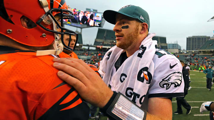 Dec 4, 2016; Cincinnati, OH, USA; Cincinnati Bengals quarterback Andy Dalton (left) greets Philadelphia Eagles quarterback Carson Wentz (right) after their game at Paul Brown Stadium. The Bengals won 32-14. Mandatory Credit: Aaron Doster-Imagn Images