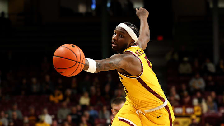 Nov 3, 2025; Minneapolis, Minnesota, USA; Minnesota Golden Gophers guard Chansey Willis Jr. (0) reaches foe the ball against Gardner-Webb Runnin' Bulldogs during the first half at Williams Arena. Mandatory Credit: Matt Krohn-Imagn Images