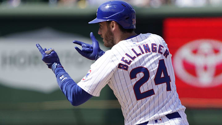 May 19, 2024; Chicago, Illinois, USA; Chicago Cubs outfielder Cody Bellinger (24) gestures after hitting a double against the Pittsburgh Pirates during the sixth inning at Wrigley Field