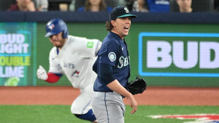 Seattle Mariners pitcher Logan Gilbert (36) reacts after giving up an RBI single to Toronto Blue Jays catcher Alejandro Kirk (30) in the fifth inning at Rogers Centre in April 2025. Seattle Mariners pitcher Logan Gilbert (36) reacts after giving up an RBI single to Toronto Blue Jays catcher Alejandro Kirk (30) in the fifth inning at Rogers Centre in April 2025.