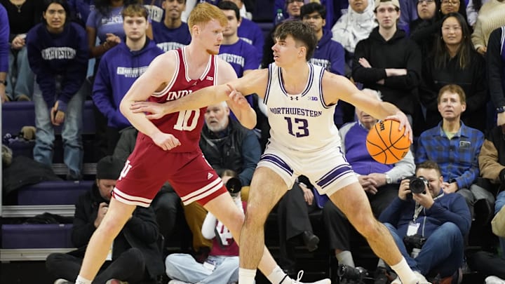 Jan 22, 2025; Evanston, Illinois, USA; Indiana Hoosiers forward Luke Goode (10) defends Northwestern Wildcats guard Brooks Barnhizer (13) during the first half at Welsh-Ryan Arena. Mandatory Credit: David Banks-Imagn Images Jan 22, 2025; Evanston, Illinois, USA; Indiana Hoosiers forward Luke Goode (10) defends Northwestern Wildcats guard Brooks Barnhizer (13) during the first half at Welsh-Ryan Arena. Mandatory Credit: David Banks-Imagn Images