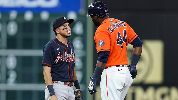 Sep 18, 2026; Houston, Texas, USA; Atlanta Braves shortstop Mauricio Dubon (14) talks with Houston Astros designated hitter Yordan Alvarez (44) after an Alvarez double during the fourth inning at Daikin Park. Mandatory Credit: Troy Taormina-Imagn Images