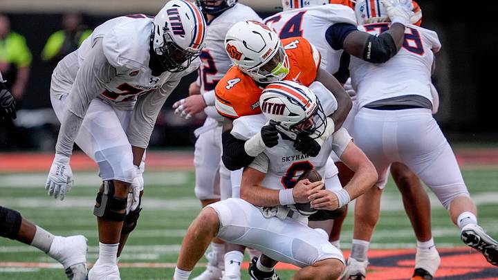 Oklahoma State linebacker Wendell Gregory (4) takes down Tennessee Martin quarterback Jase Bauer (8) in the first quarter during an NCAA football game between Oklahoma State (OSU) and UT Martin in Stillwater, Okla., on Thursday, Aug. 28, 2025. Oklahoma State linebacker Wendell Gregory (4) takes down Tennessee Martin quarterback Jase Bauer (8) in the first quarter during an NCAA football game between Oklahoma State (OSU) and UT Martin in Stillwater, Okla., on Thursday, Aug. 28, 2025.