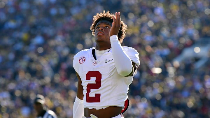 Jan 1, 2024; Pasadena, CA, USA; Alabama Crimson Tide defensive back Caleb Downs (2) prays with