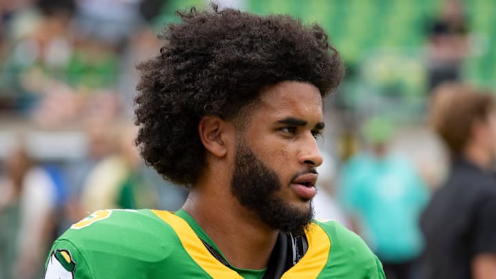 Oregon quarterback Dante Moore warms up as the Oregon Ducks host the Oklahoma State Cowboys on Sept. 6, 2025, at Autzen Stadium in Eugene, Oregon.