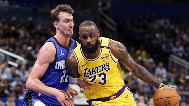 Los Angeles Lakers forward LeBron James drives to the basket against the Orlando Magic.